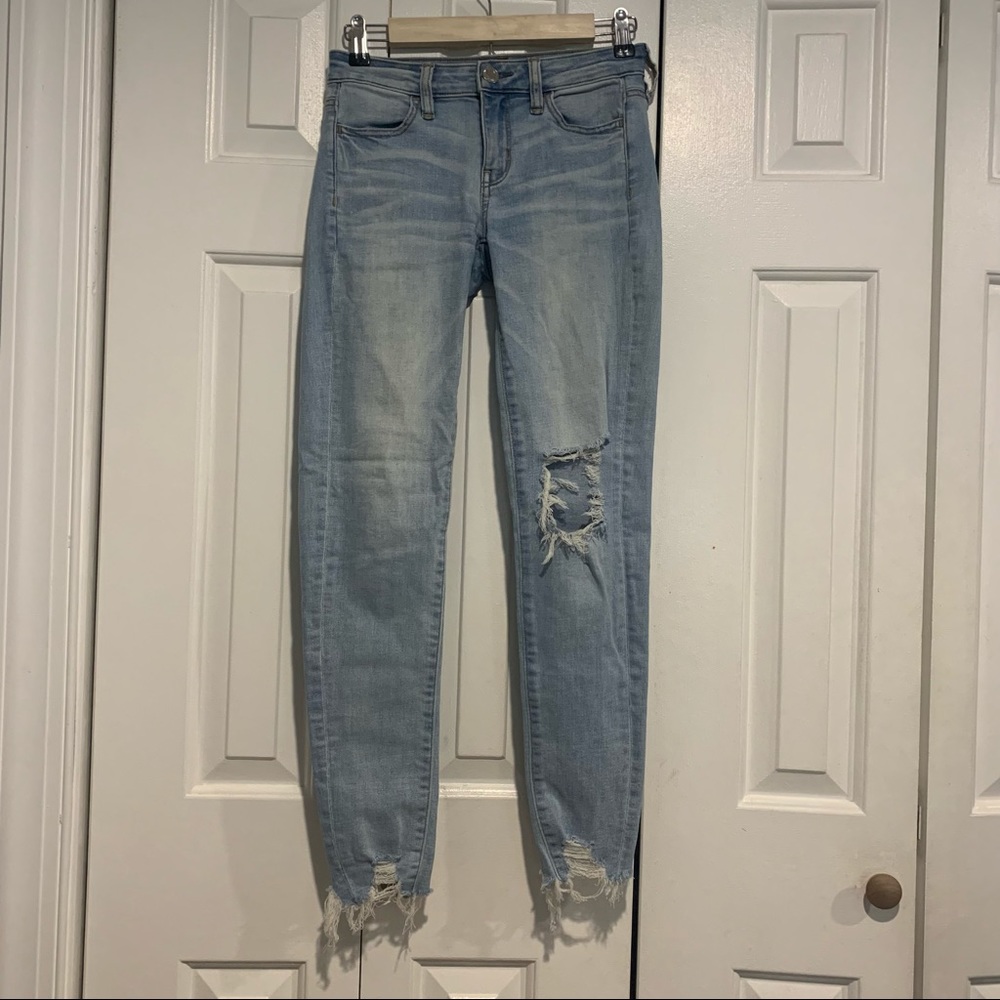 American eagle distressed light raw hem jeggings